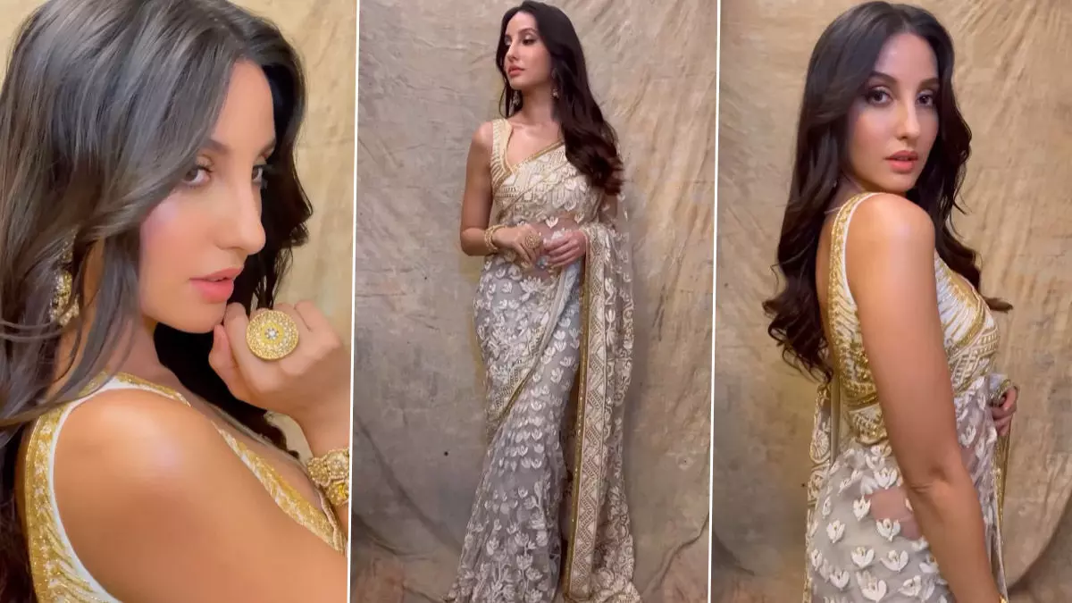 Nora Fatehi Sexy Video Photos: गोल्डन साड़ी में नोरा फतेही का दिखा Sexy अवतार