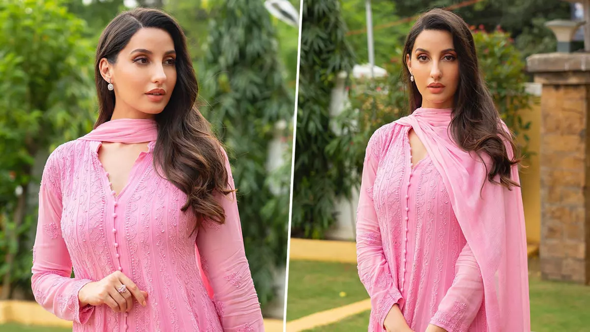 Nora Fatehi Sexy Video: Nora Fatehi का पिंक सूट में दिखा दिलकश अंदाज, एक्ट्रेस की खूबसूरती के सामने कायल हुए यूजर्स